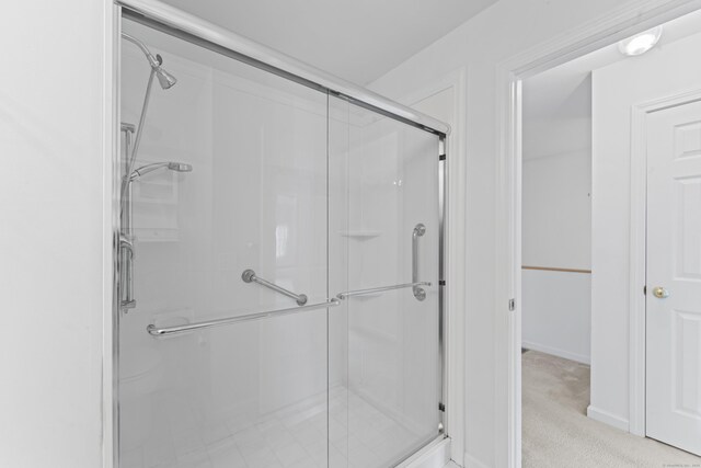 56 Pembroke Rd Apt 11, Danbury, CT 06811 - full bathroom with a shower stall and baseboards