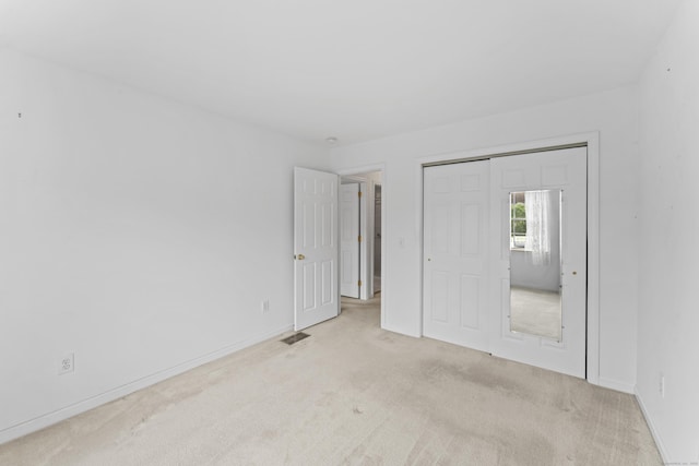 56 Pembroke Rd Apt 11, Danbury, CT 06811 - unfurnished bedroom with carpet floors, a closet, and baseboards