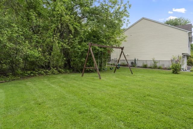56 Pembroke Rd Apt 11, Danbury, CT 06811 - view of grassy yard featuring a playground