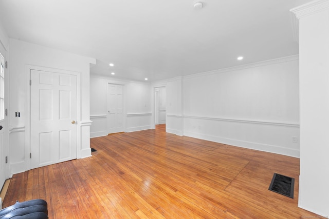 2921 Nichols Ave, Trumbull, CT 06611 - spare room with crown molding, recessed lighting, light wood-type flooring, and a smoke detector