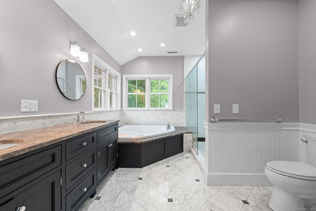 2921 Nichols Ave, Trumbull, CT 06611 - bathroom with wainscoting, a bath, double vanity, a stall shower, and marble finish floors