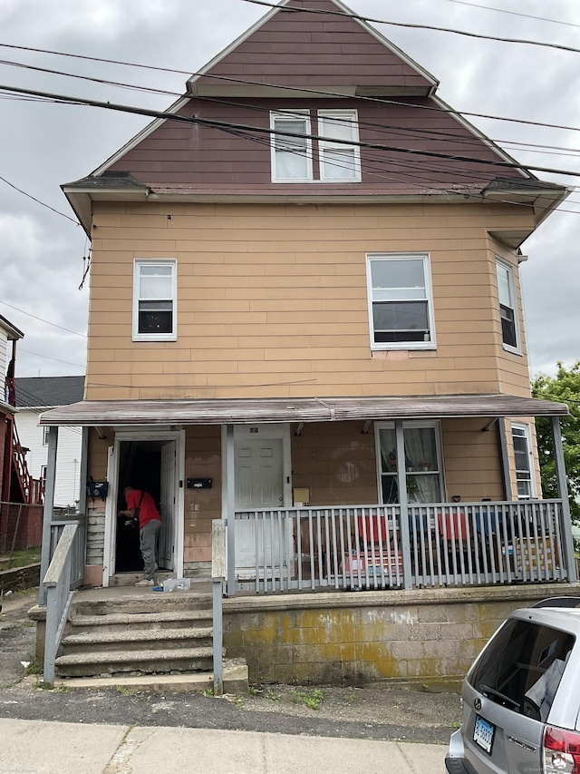 74 Branch St, Waterbury, CT 06704 - view of front of home featuring covered porch