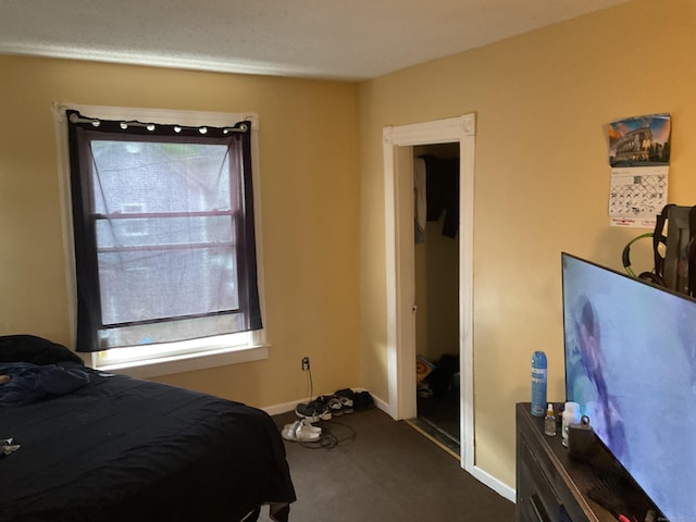 74 Branch St, Waterbury, CT 06704 - bedroom with dark carpet and baseboards