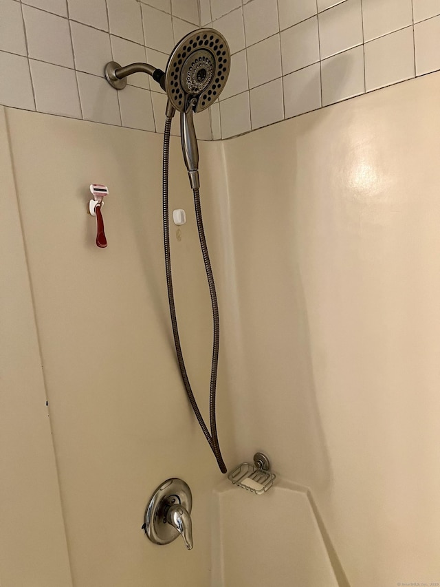 bathroom view of tiled shower