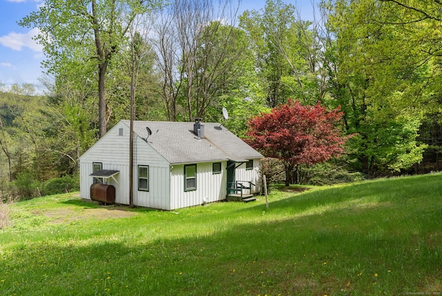 278AND282 Farnum Rd, Salisbury, CT 06039 - rear view of property with board and batten siding, oil tank, a yard, and roof with shingles
