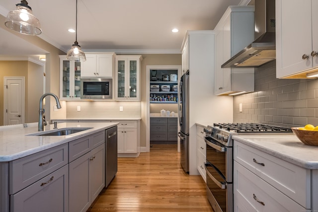 3 Prospect Rdg, Simsbury, CT 06070 - kitchen with wall chimney range hood, a sink, appliances with stainless steel finishes, crown molding, and decorative backsplash