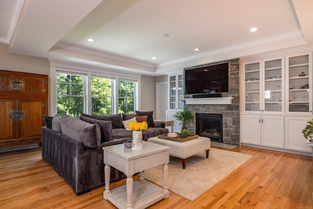 3 Prospect Rdg, Simsbury, CT 06070 - living room with a tray ceiling, light wood finished floors, ornamental molding, a fireplace, and recessed lighting