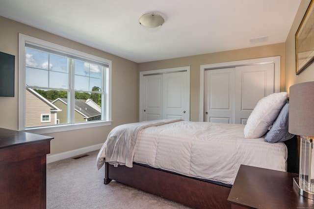 3 Prospect Rdg, Simsbury, CT 06070 - carpeted bedroom featuring two closets and baseboards