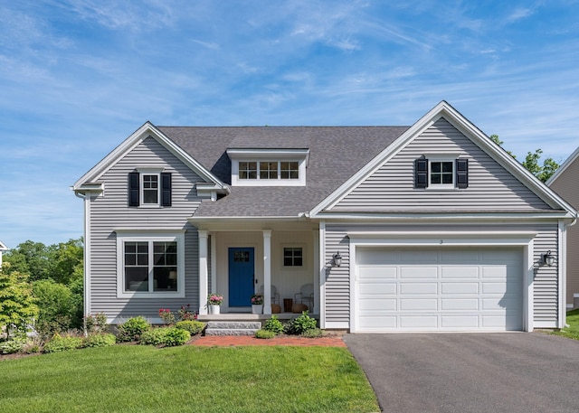 3 Prospect Rdg, Simsbury, CT 06070 - view of front facade with asphalt driveway, roof with shingles, a front yard, a garage, and a porch