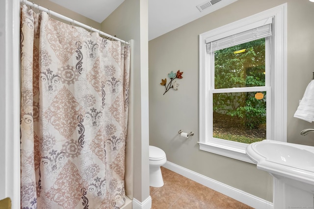 645 Prospect Ave Unit 11, West Hartford, CT 06105 - bathroom with toilet, baseboards, tile patterned flooring, and curtained shower