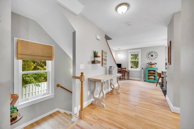 645 Prospect Ave Unit 11, West Hartford, CT 06105 - corridor with wood finished floors, baseboards, and an upstairs landing