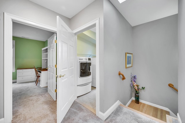 645 Prospect Ave Unit 11, West Hartford, CT 06105 - hallway featuring separate washer and dryer, an upstairs landing, baseboards, and carpet flooring
