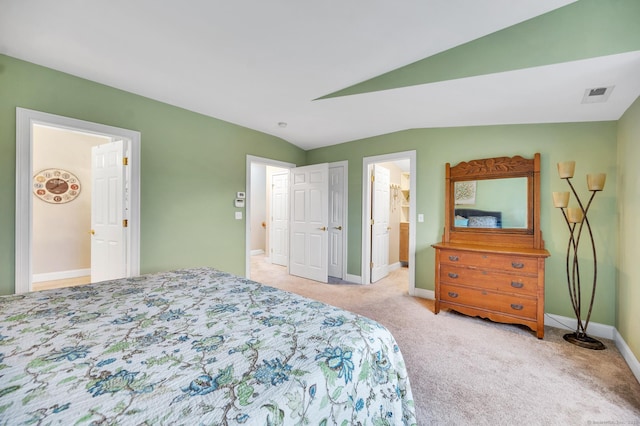 645 Prospect Ave Unit 11, West Hartford, CT 06105 - bedroom with carpet flooring, lofted ceiling, baseboards, and connected bathroom