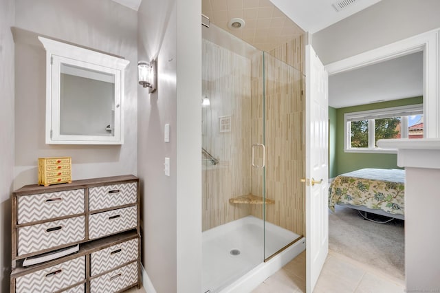 645 Prospect Ave Unit 11, West Hartford, CT 06105 - bathroom featuring a stall shower, tile patterned flooring, and ensuite bathroom