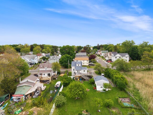 62 Surf Ave, Milford, CT 06460 - aerial view of property and surrounding area featuring nearby suburban area and a tree filled landscape