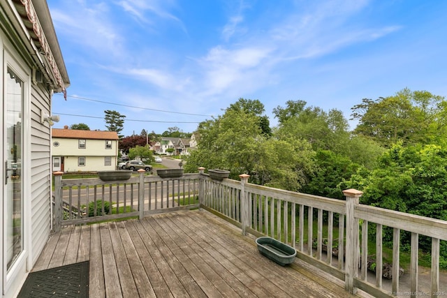62 Surf Ave, Milford, CT 06460 - wooden deck with a residential view