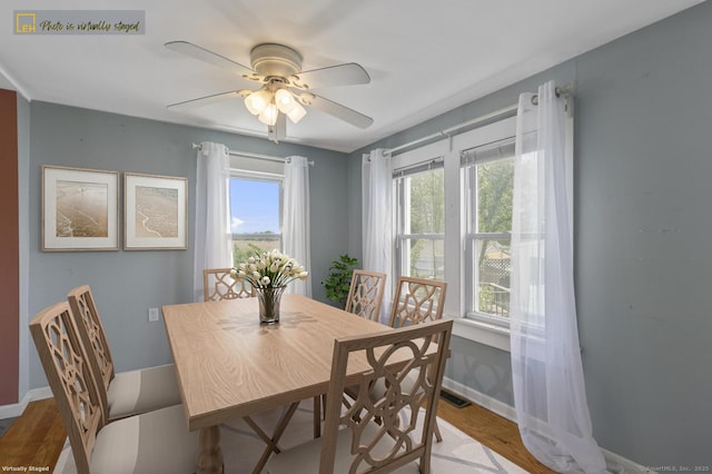 62 Surf Ave, Milford, CT 06460 - dining room with light wood-style floors, baseboards, and a ceiling fan