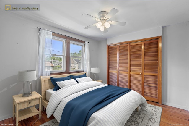 62 Surf Ave, Milford, CT 06460 - bedroom featuring a closet, baseboards, wood finished floors, and ceiling fan