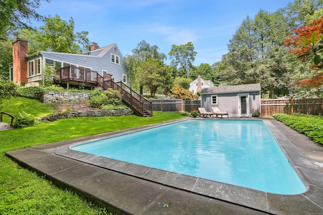 11 Overlook Rd, Westport, CT 06880 - view of swimming pool with an outdoor structure, a fenced backyard, a wooden deck, stairway, and a storage structure