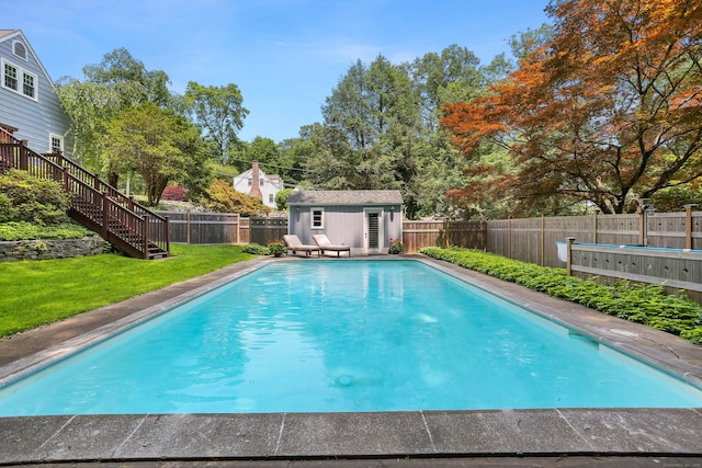 11 Overlook Rd, Westport, CT 06880 - view of swimming pool with an outdoor structure, a fenced backyard, and stairs
