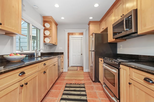 11 Overlook Rd, Westport, CT 06880 - kitchen featuring appliances with stainless steel finishes, light brown cabinets, dark stone counters, and recessed lighting