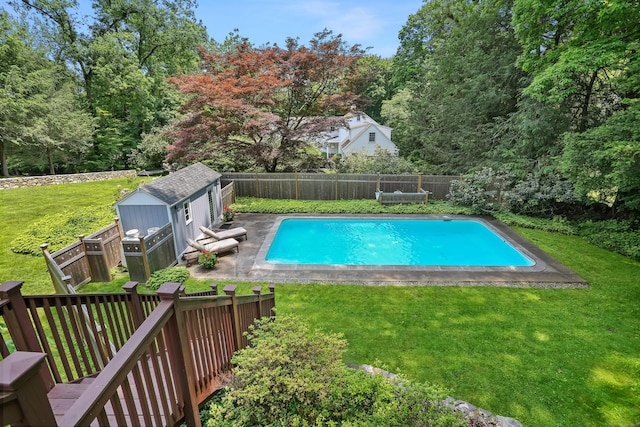 11 Overlook Rd, Westport, CT 06880 - view of swimming pool with a fenced backyard and an outbuilding