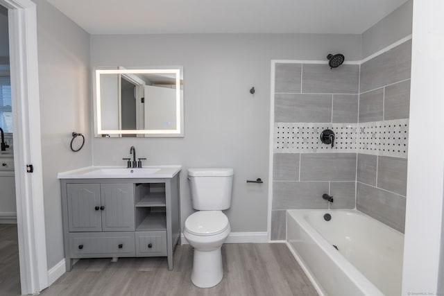 670 Putnam Pike, Rhode Island, RI 02828 - full bath with wood finished floors, baseboards, toilet, and shower / bathtub combination