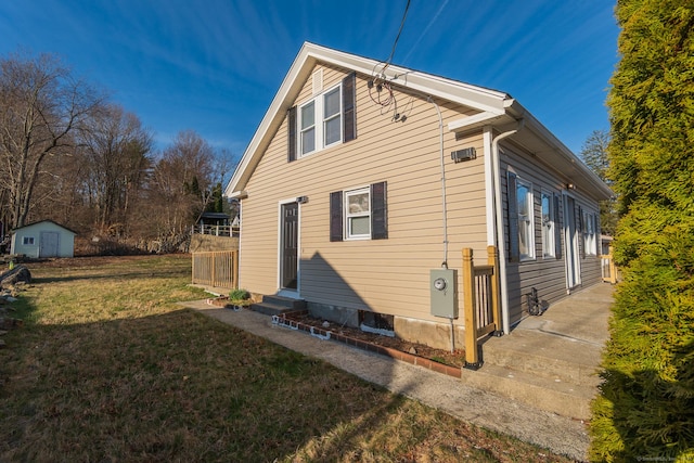 670 Putnam Pike, Rhode Island, RI 02828 - view of property exterior with a lawn