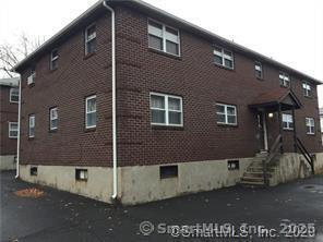 17 Mead St Apt C, New Britain, CT 06051 - view of home's exterior with brick siding