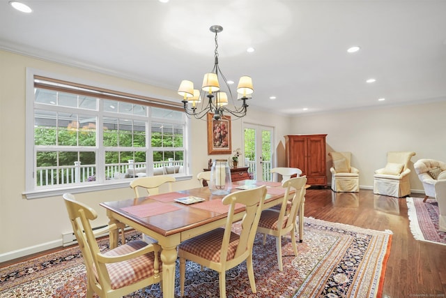 27 E Gate Rd, Danbury, CT 06811 - dining room with a chandelier, ornamental molding, wood finished floors, recessed lighting, and baseboards