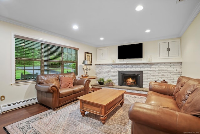 27 E Gate Rd, Danbury, CT 06811 - living room with a baseboard radiator, crown molding, wood finished floors, a fireplace, and recessed lighting