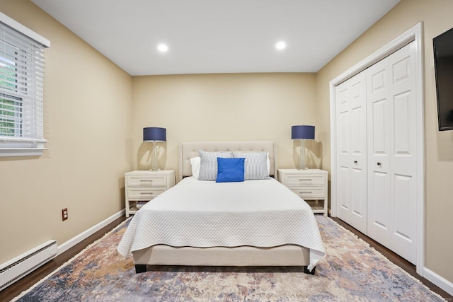 27 E Gate Rd, Danbury, CT 06811 - bedroom featuring a baseboard radiator, dark wood-style floors, baseboards, recessed lighting, and a closet