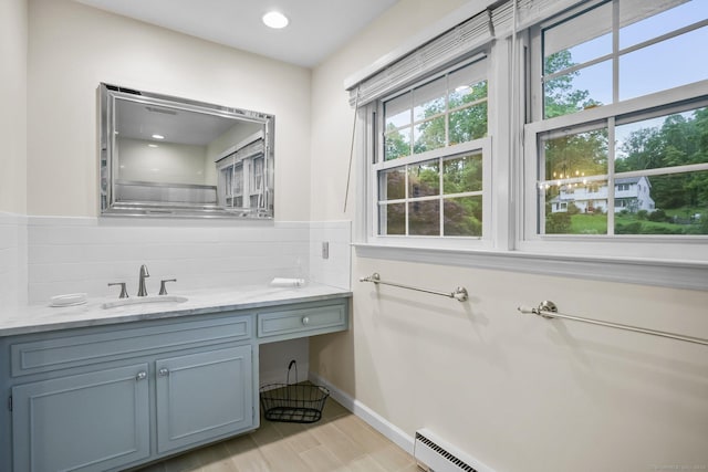 27 E Gate Rd, Danbury, CT 06811 - bathroom featuring vanity, backsplash, recessed lighting, baseboards, and wood finished floors