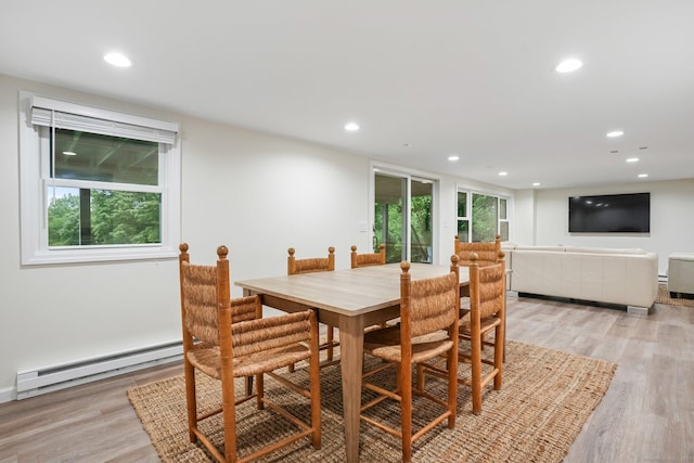 27 E Gate Rd, Danbury, CT 06811 - dining space featuring baseboard heating, recessed lighting, and light wood-type flooring