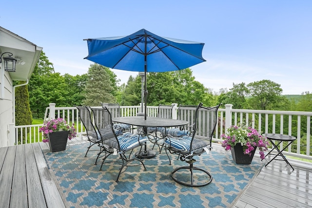 27 E Gate Rd, Danbury, CT 06811 - wooden deck with outdoor dining space and view of scattered trees