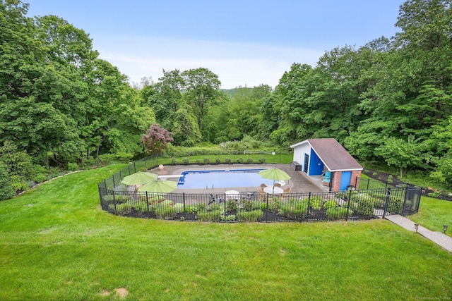 27 E Gate Rd, Danbury, CT 06811 - view of swimming pool with a patio, an outbuilding, and a wooded view