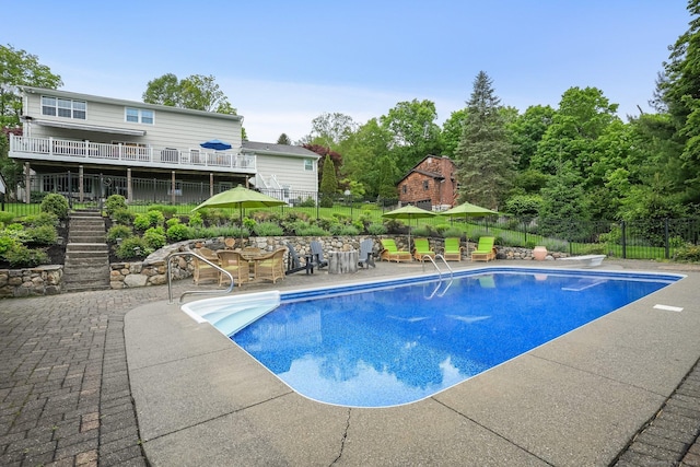 27 E Gate Rd, Danbury, CT 06811 - view of swimming pool featuring a patio, stairway, and a diving board