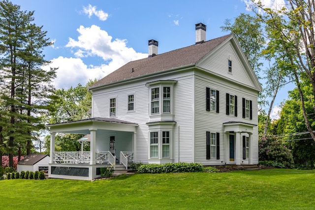 118 S St, Litchfield, CT 06759 - back of property featuring a porch, a lawn, and a chimney