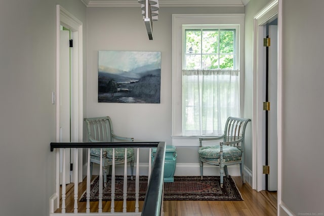 118 S St, Litchfield, CT 06759 - sitting room featuring wood finished floors, baseboards, plenty of natural light, and crown molding