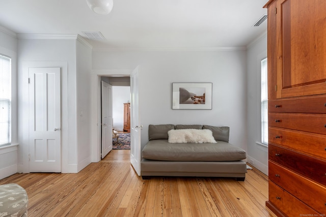 118 S St, Litchfield, CT 06759 - living area featuring baseboards, ornamental molding, and light wood finished floors