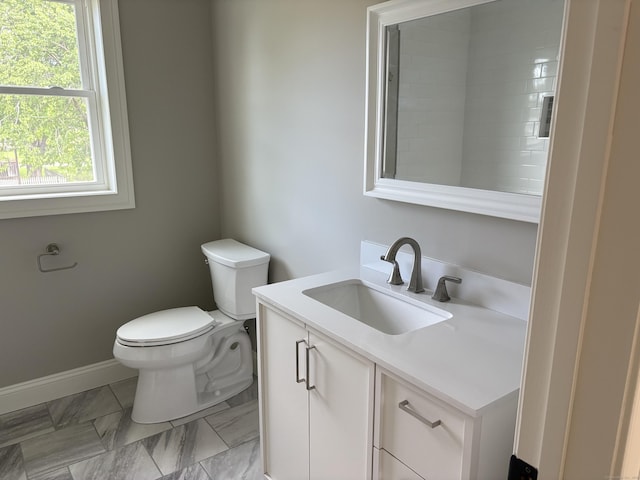 19 Race Ave, Plainville, CT 06062 - bathroom featuring vanity, toilet, and baseboards
