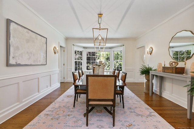 42 Morningside Dr S, Westport, CT 06880 - dining area featuring a decorative wall, dark wood-type flooring, crown molding, and a wainscoted wall