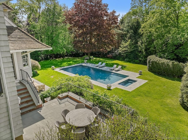 42 Morningside Dr S, Westport, CT 06880 - view of pool featuring a patio, a yard, and a pool with connected hot tub