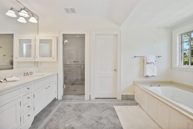 42 Morningside Dr S, Westport, CT 06880 - full bathroom with a stall shower, vanity, a garden tub, and marble look tiles