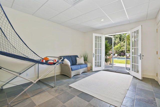42 Morningside Dr S, Westport, CT 06880 - living area featuring french doors, a paneled ceiling, baseboards, and recessed lighting