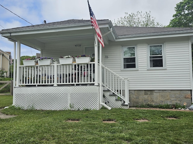 16 Walnut St (Pawcatuck), Unit Pawcatuck Stonington, CT 06379 - back of property with a lawn and a shingled roof