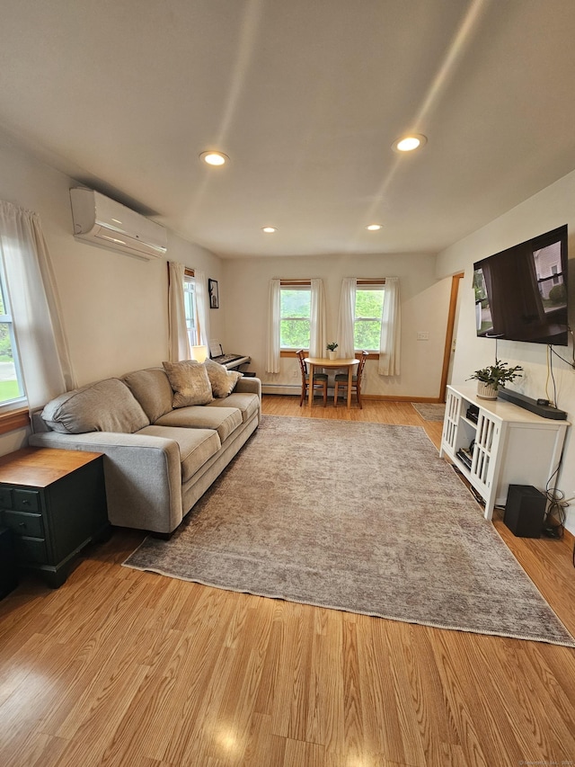16 Walnut St (Pawcatuck), Unit Pawcatuck Stonington, CT 06379 - living room with a wall unit AC, recessed lighting, and light wood-style floors