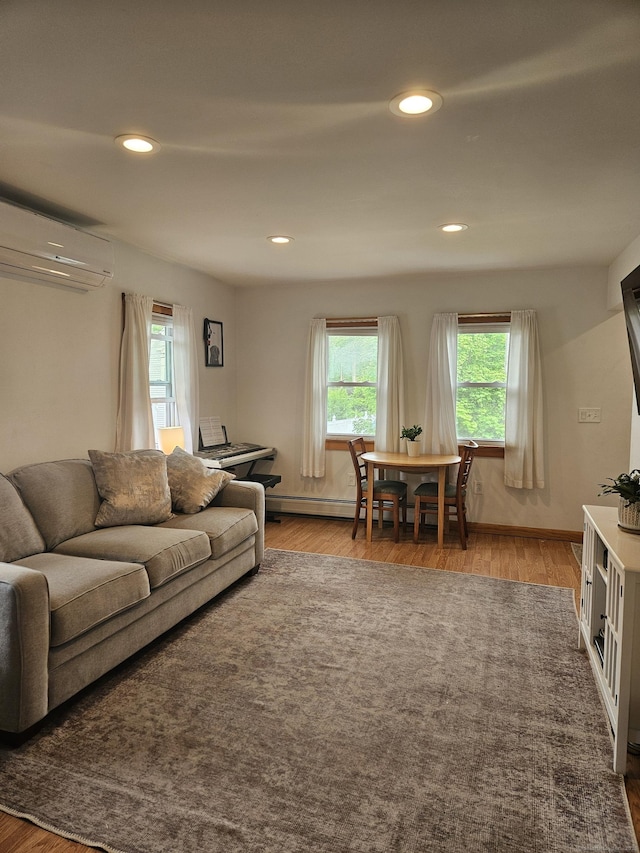 16 Walnut St (Pawcatuck), Unit Pawcatuck Stonington, CT 06379 - living area featuring a wall unit AC, plenty of natural light, light wood-style floors, recessed lighting, and baseboards