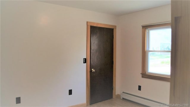 16 Walnut St (Pawcatuck), Unit Pawcatuck Stonington, CT 06379 - spare room featuring healthy amount of natural light and a baseboard radiator