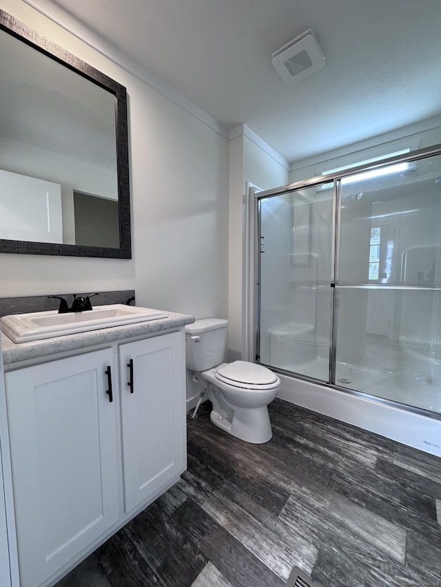 4 N Ter, Vernon, CT 06066 - full bathroom with toilet, wood finished floors, a shower stall, vanity, and crown molding